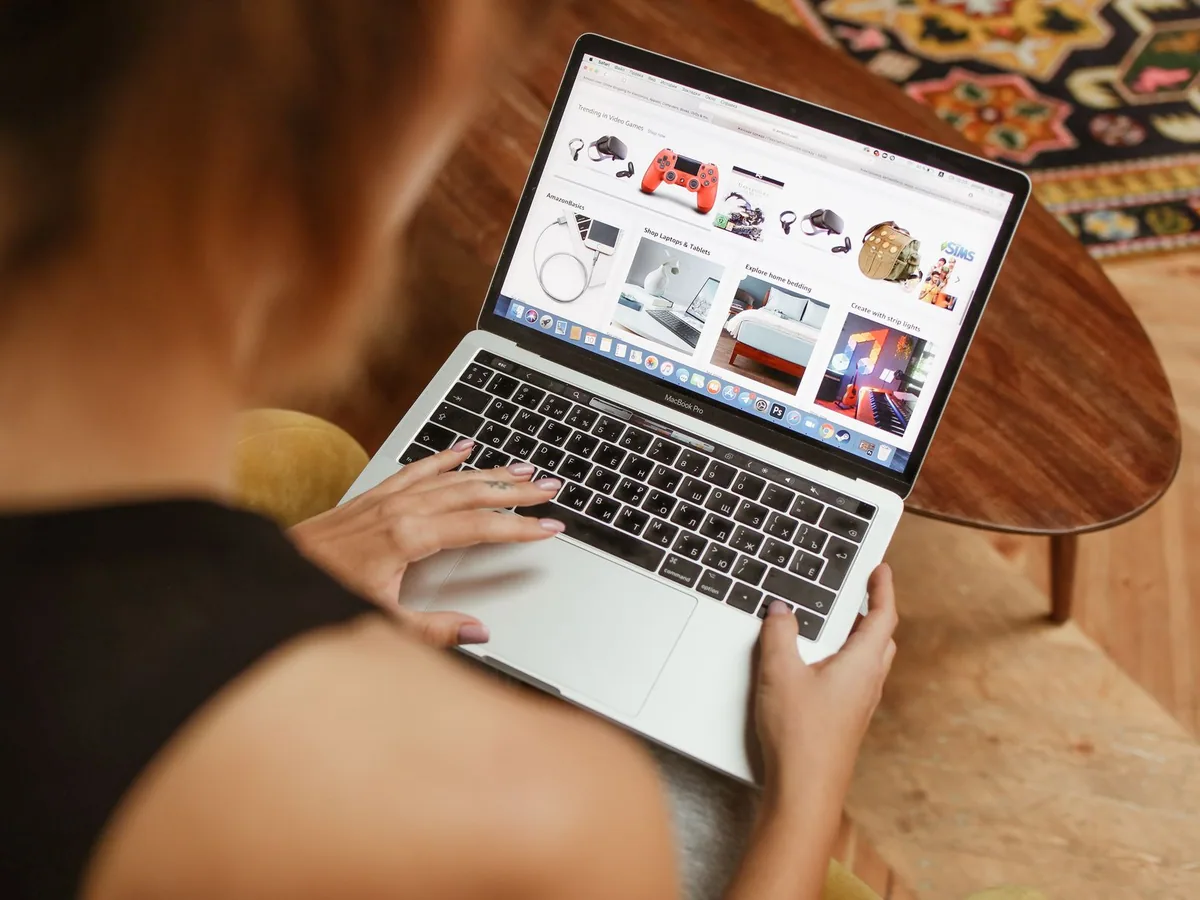 Person browsing an online shop on a laptop
