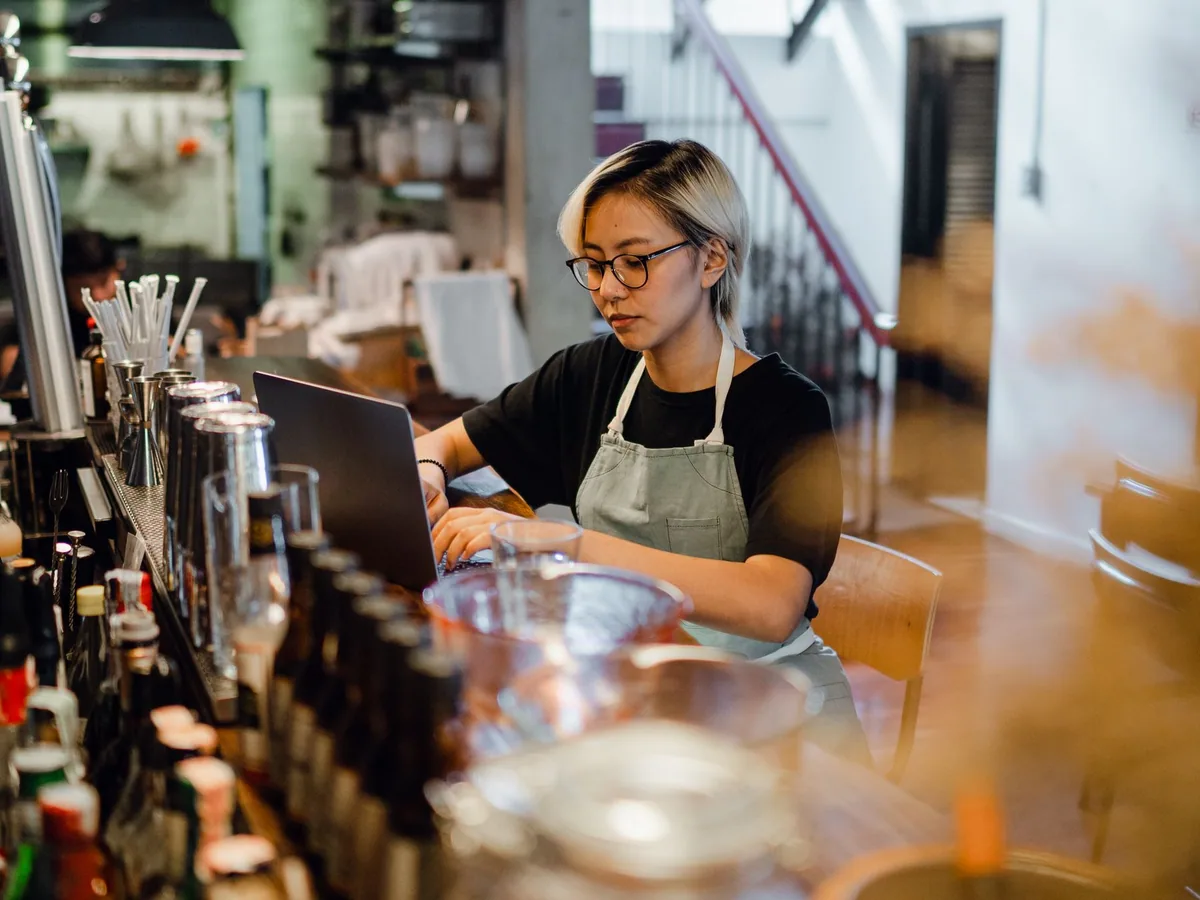 Cafe professional working behind the counter